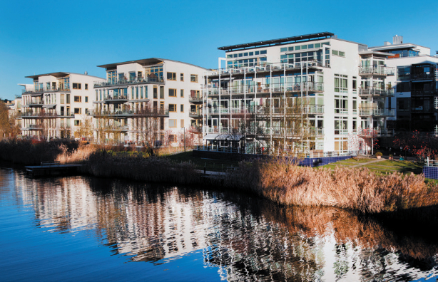 Photo of buildings by the water